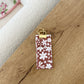 Porte-gloss | Bourgogne et fleurs blanches