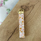 Porte-clés | Bracelet | Fleurs roses et oranges