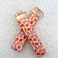 Porte-clés | Bracelet | Fleurs oranges et fuchsia