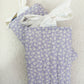 Pochette à liseuse & livre poche | Marguerite mauve avec boucle blanche